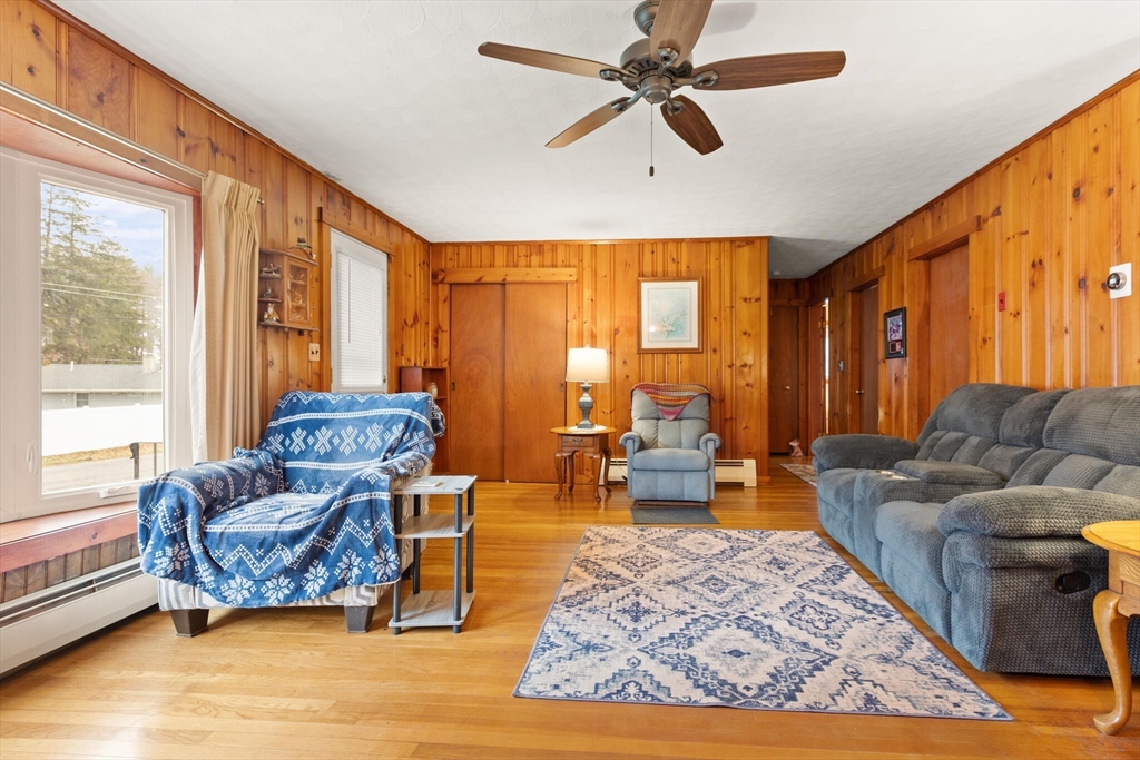 4 Vernon Street Ayer, MA 01432 - Photo 8 of 23 a living room with furniture and a large window