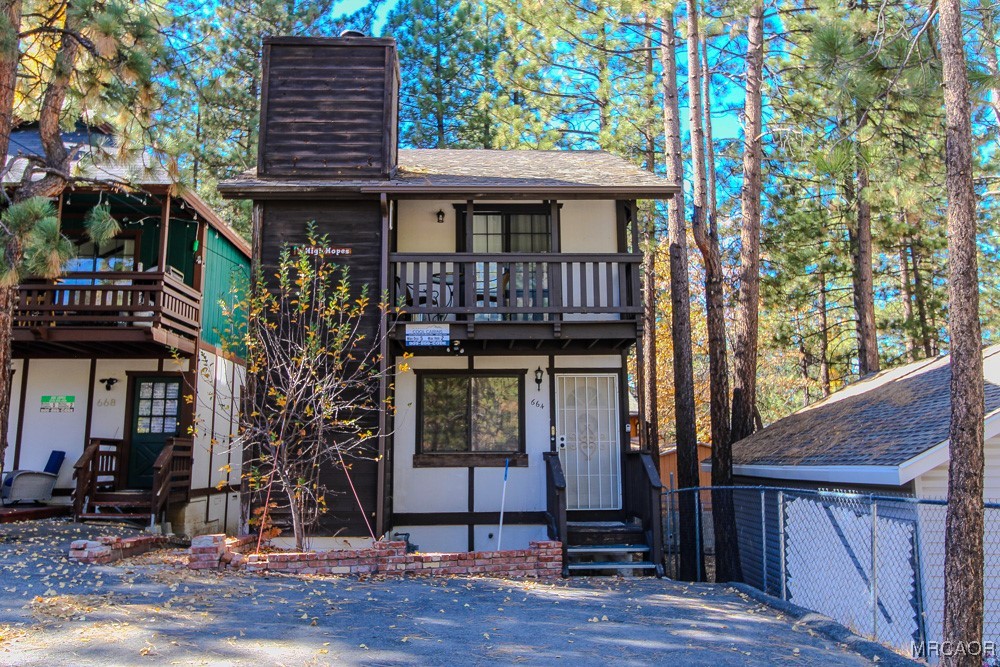 664 Knight Avenue Big Bear Lake, CA 92315 - Photo 1 of 35 a front view of a house with balcony