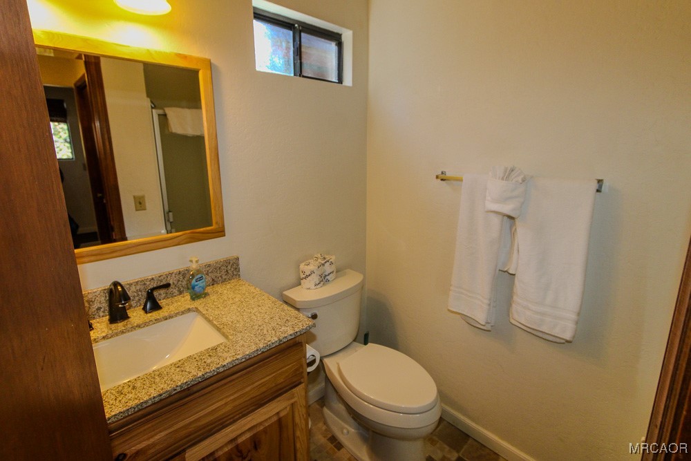 664 Knight Avenue Big Bear Lake, CA 92315 - Photo 15 of 35 a bathroom with a sink and toilet