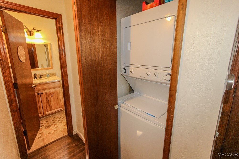 664 Knight Avenue Big Bear Lake, CA 92315 - Photo 18 of 35 storage and utility room with washer and dryer