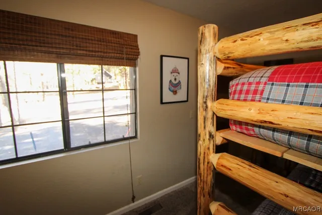 a view of a room with racks on the wall