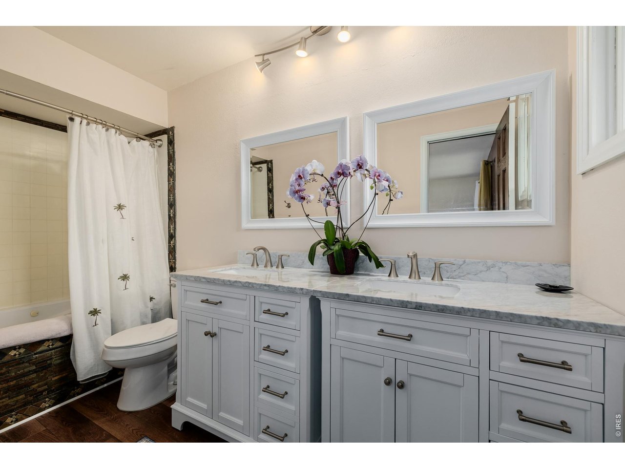 37 High View Lane Boulder, CO 80302 - Photo 20 of 50 a bathroom with a granite countertop sink mirror and toilet
