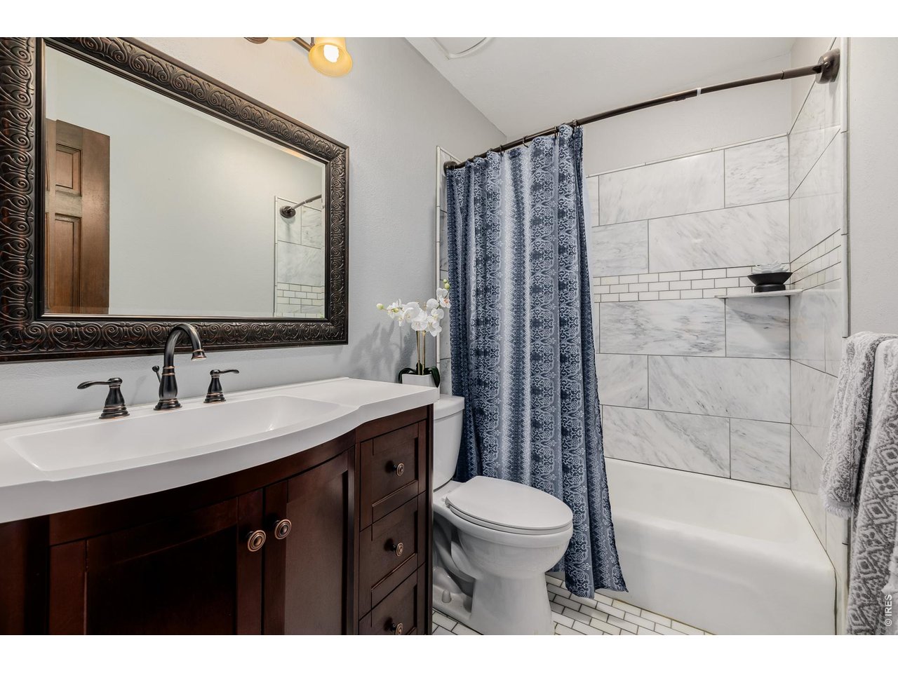 37 High View Lane Boulder, CO 80302 - Photo 23 of 50 a bathroom with a sink a toilet and shower