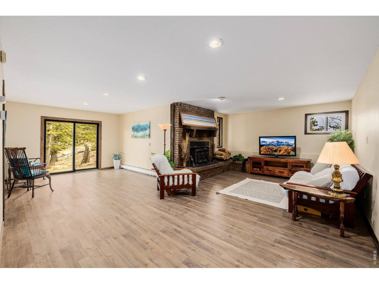37 High View Lane Boulder, CO 80302 - Photo 25 of 50 a living room with furniture and a flat screen tv