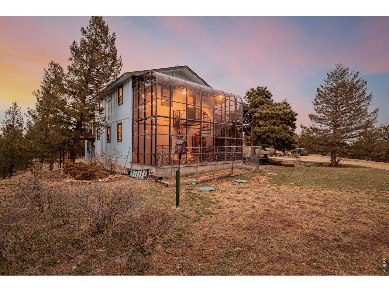 37 High View Lane Boulder, CO 80302 - Photo 34 of 50 a backyard of a house with table and chairs