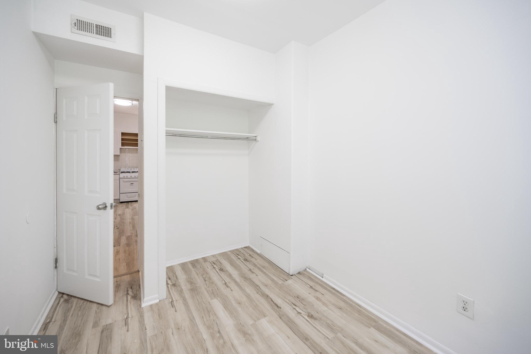 625 South 10th Street, Unit 2F Philadelphia, PA 19147 - Photo 10 of 13 a view of a room with wooden floor