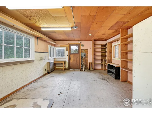 a view of a livingroom with a fireplace