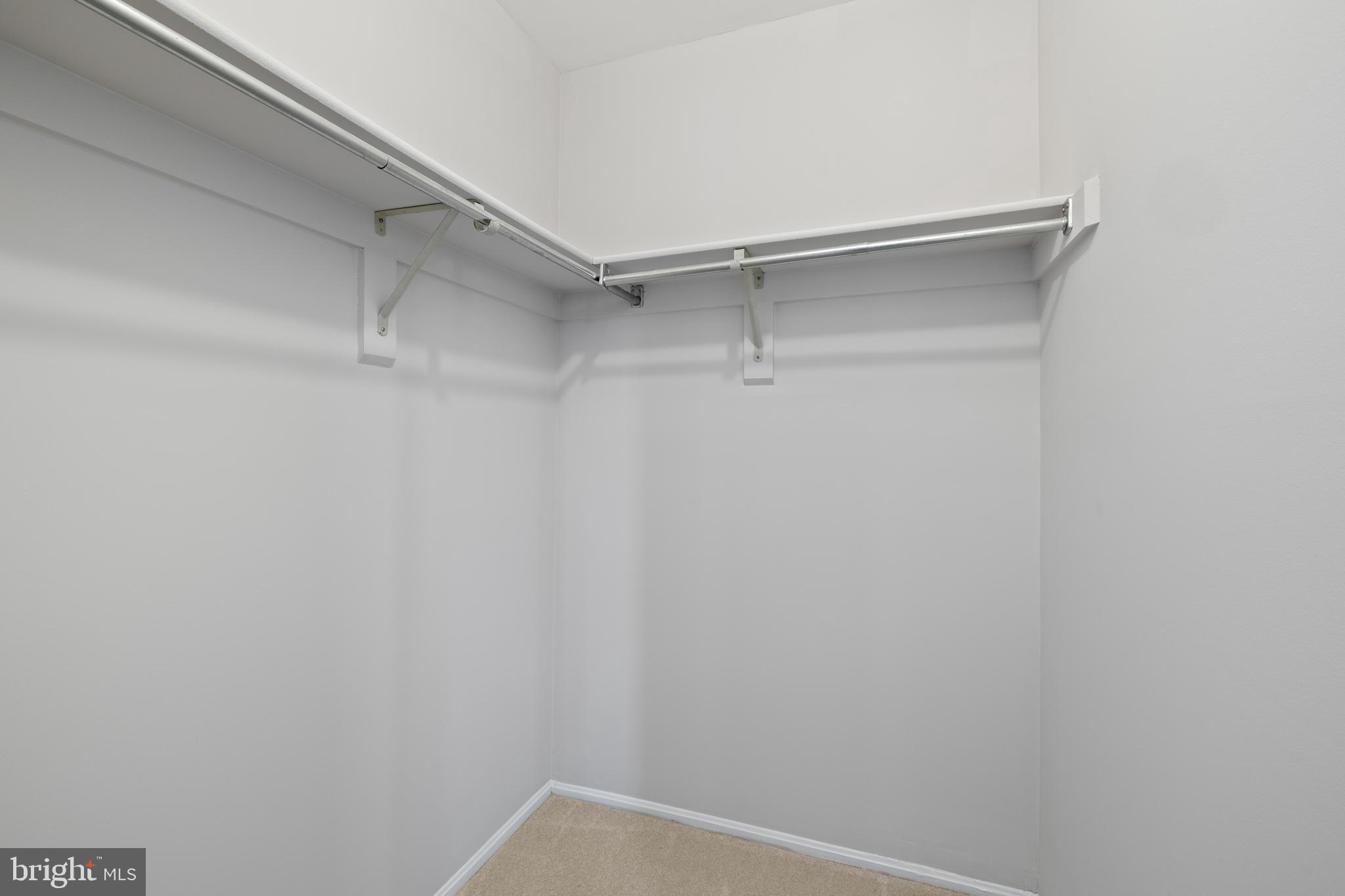 107 Fort Evans Road Southeast, Unit F Leesburg, VA 20175 - Photo 7 of 30 Primary Bedroom Walk-in Closet