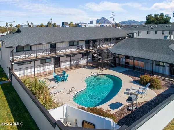 an aerial view of a house having outdoor seating