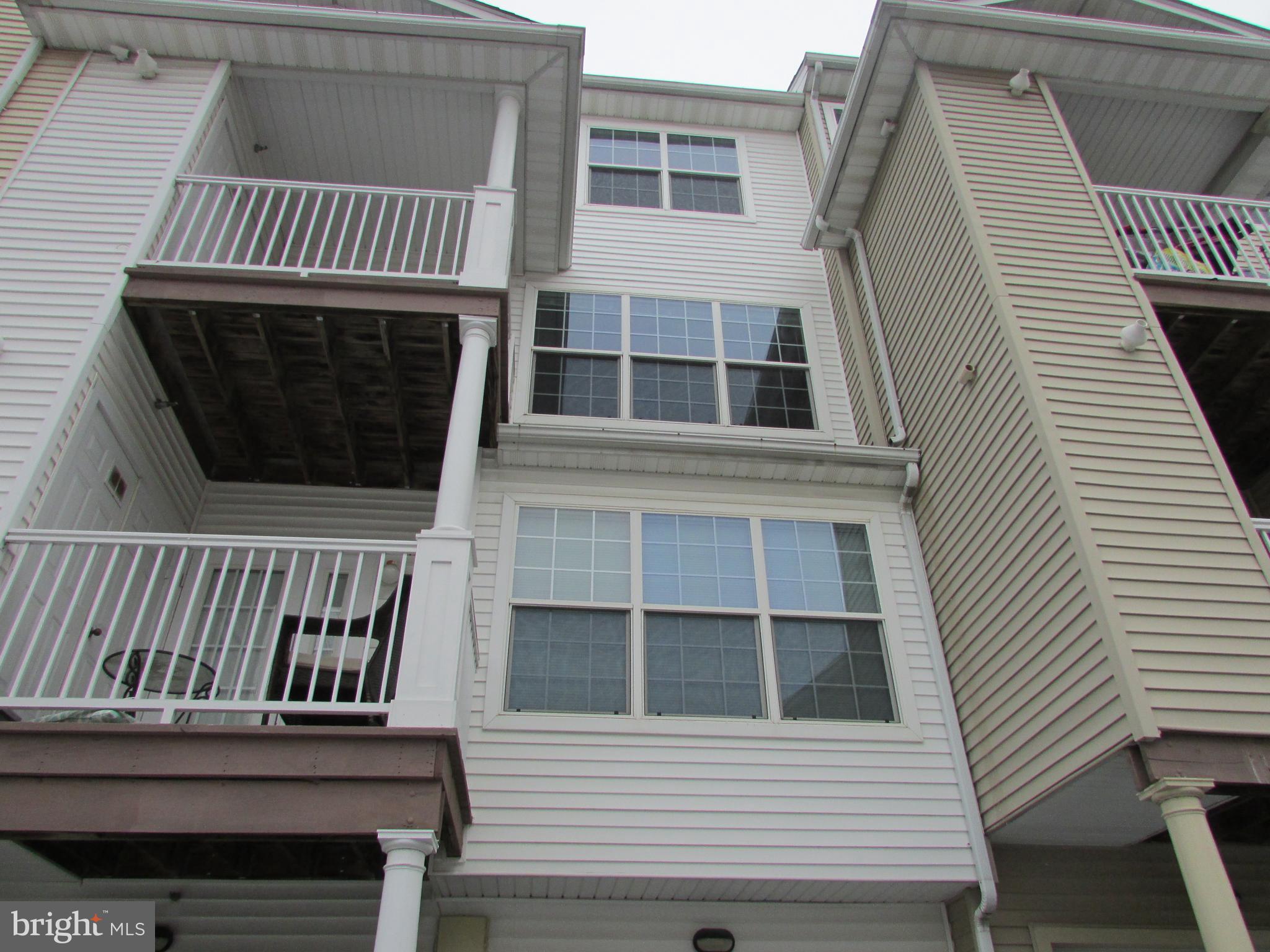 12989 Middlebrook Road, Unit 6 Germantown, MD 20874 - Photo 2 of 23 REAR