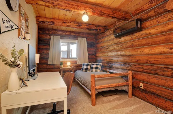 a bathroom with a sink a washer and dryer