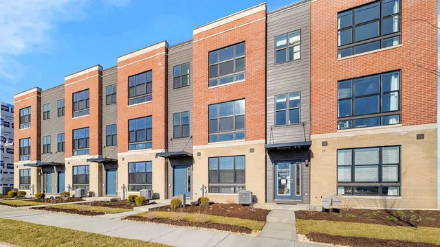 a front view of a building with street