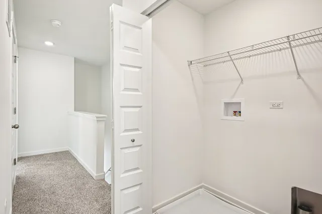 an empty room with a bathroom