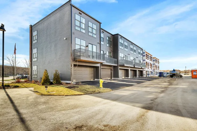 a front view of a building with street view
