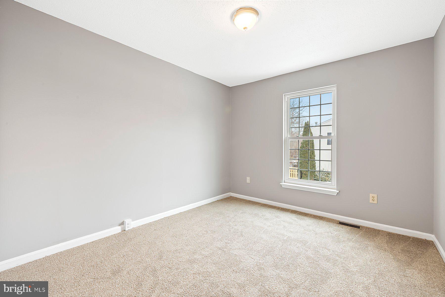 6795 Snow Goose Court Frederick, MD 21703 - Photo 15 of 36 an empty room with a window