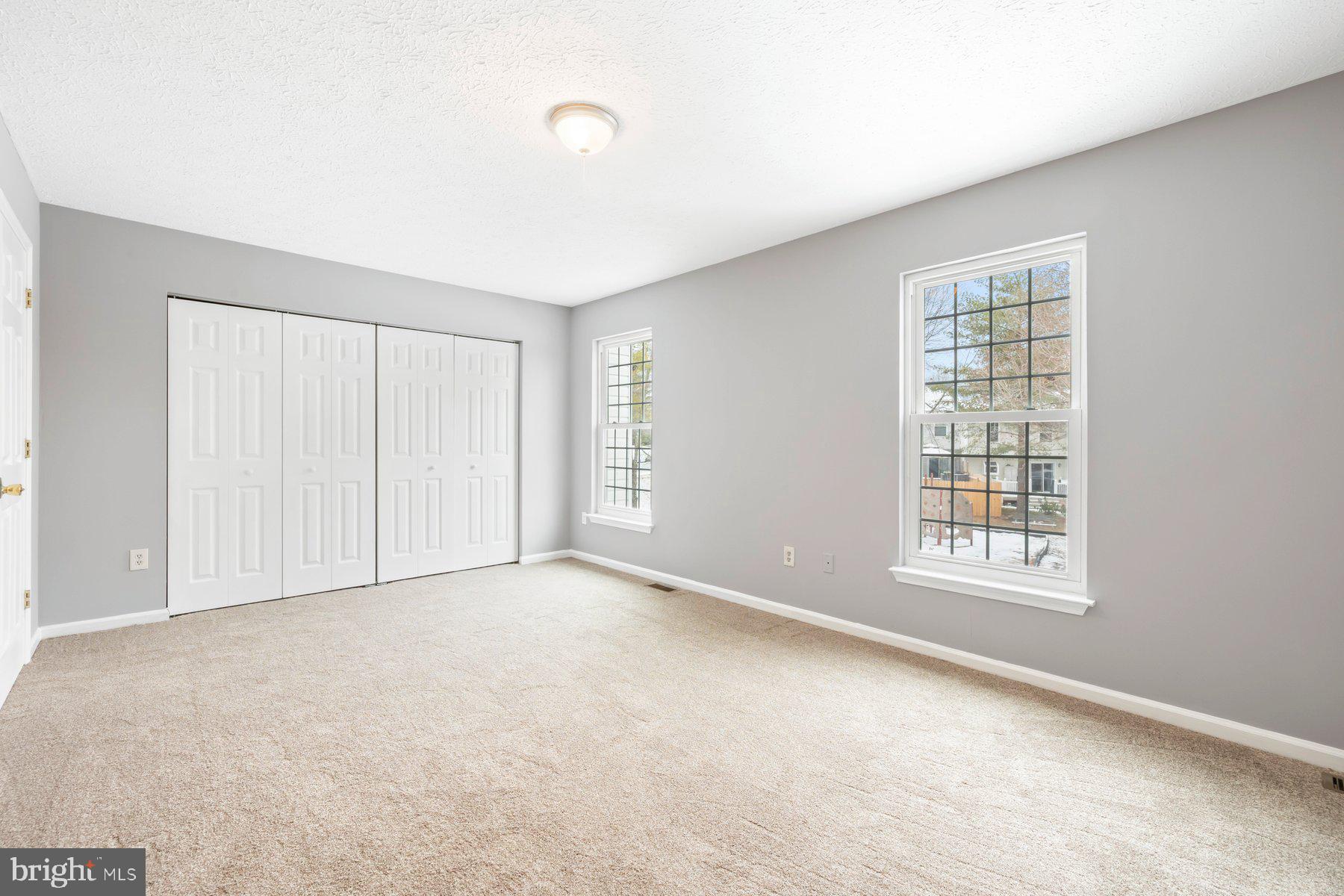 6795 Snow Goose Court Frederick, MD 21703 - Photo 16 of 36 a view of an empty room with a window