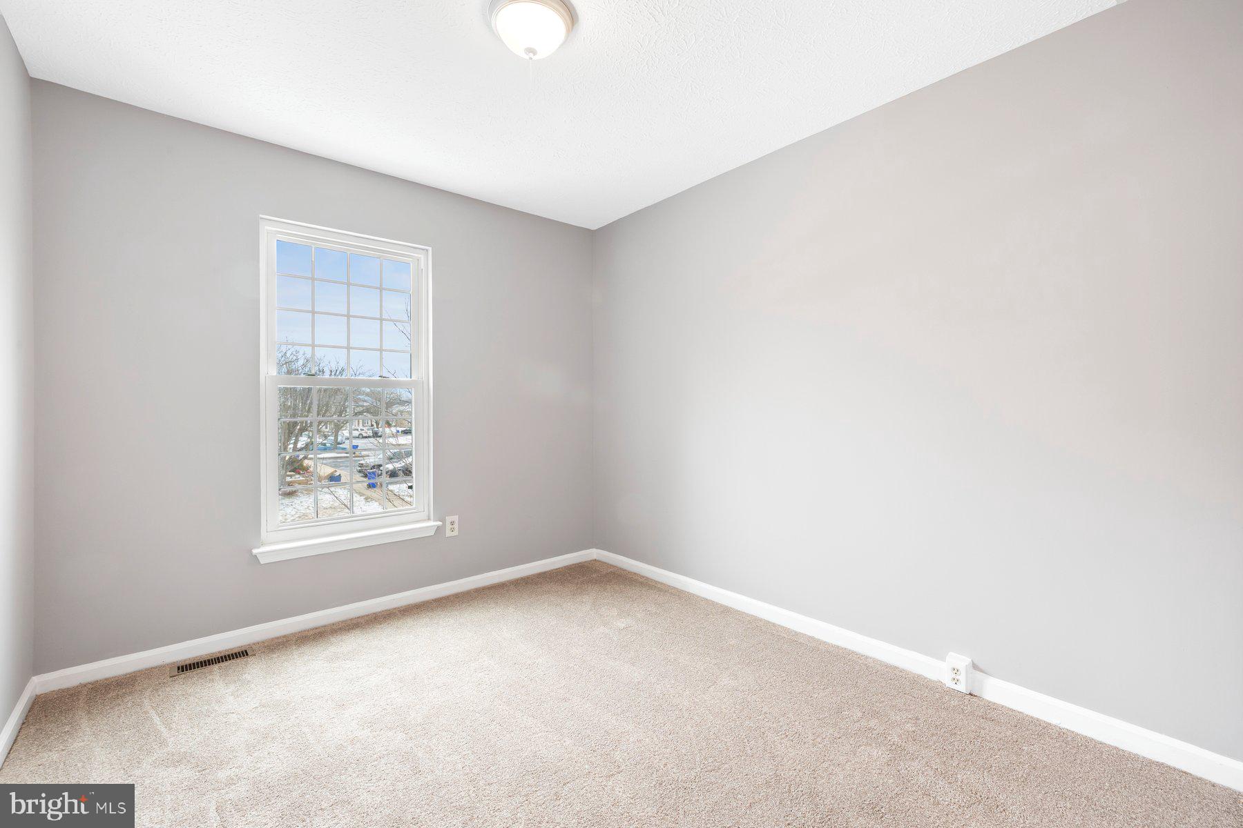 6795 Snow Goose Court Frederick, MD 21703 - Photo 20 of 36 an empty room with windows