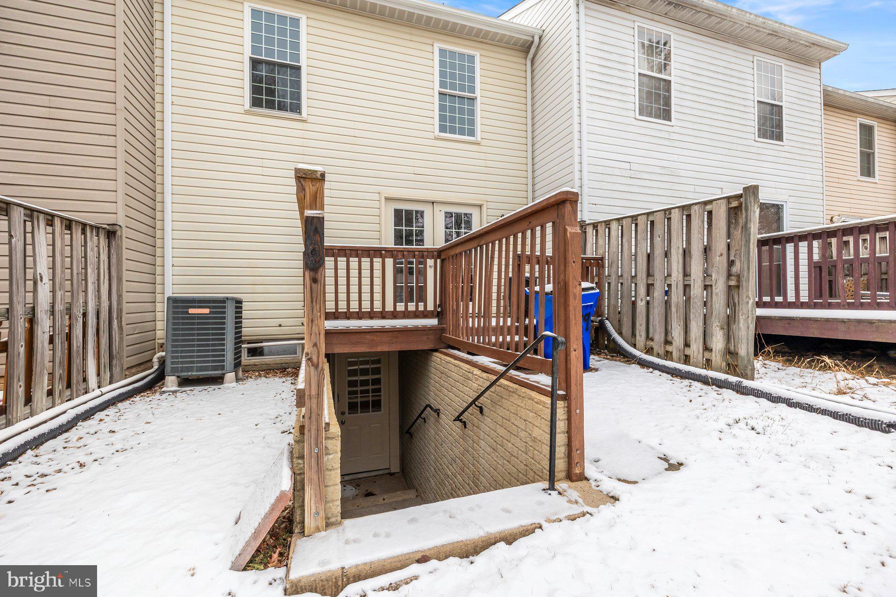 6795 Snow Goose Court Frederick, MD 21703 - Photo 30 of 36 a view of a house with wooden fence