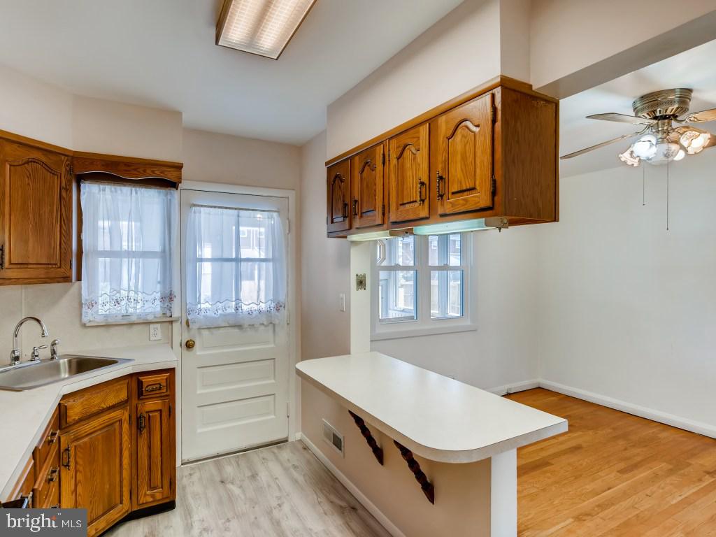 1903 Stanhope Road Dundalk, MD 21222 - Photo 8 of 27 Kitchen has back door to sunroom