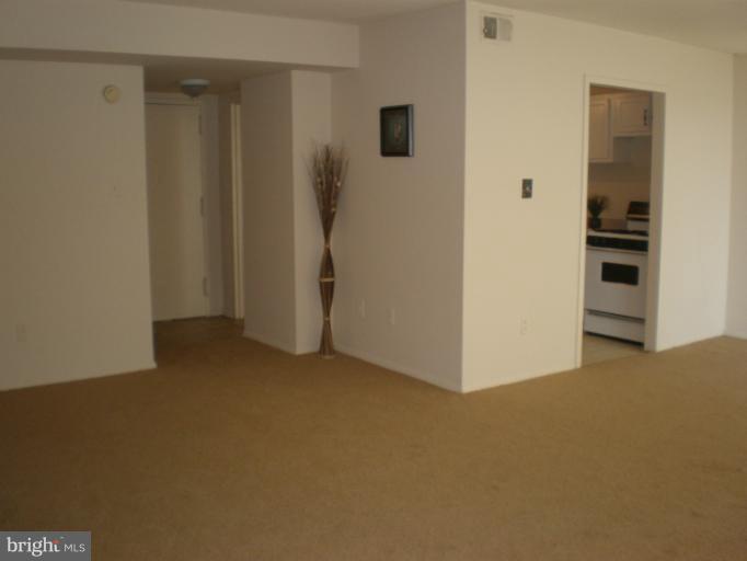 1836 Metzerott Road, Unit 1711 Hyattsville, MD 20783 - Photo 15 of 16 a view of a kitchen