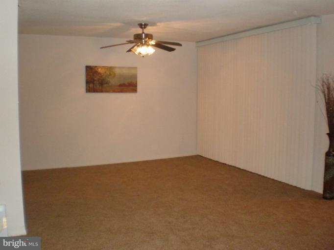 1836 Metzerott Road, Unit 1711 Hyattsville, MD 20783 - Photo 7 of 16 a view of an empty room