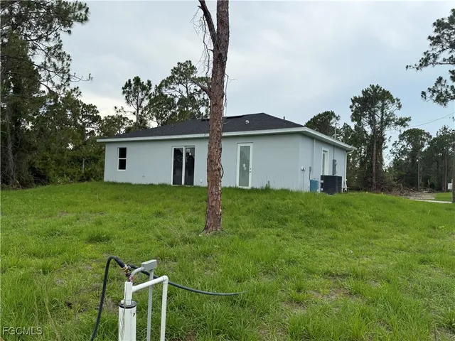 a view of a backyard with a garden