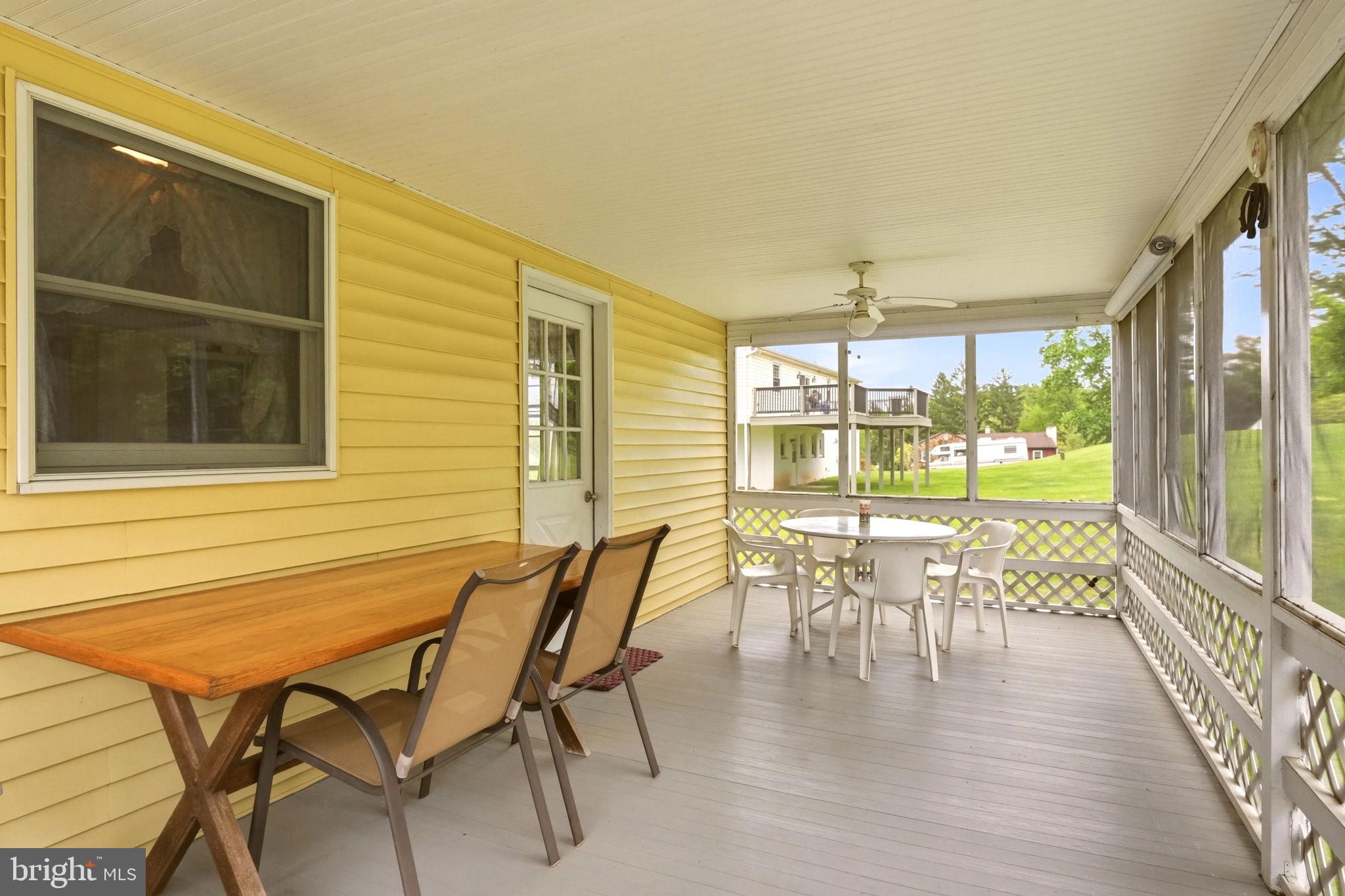 222 Coldstream Road Phoenixville, PA 19460 - Photo 42 of 50 Charming screened porch for relaxation.