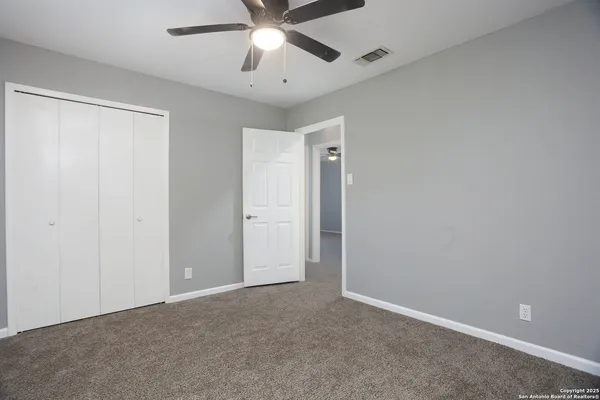 a bathroom with a sink toilet and vanity