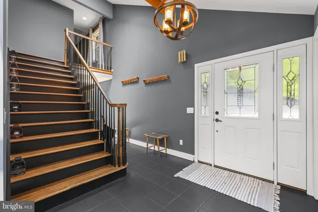 a kitchen with lots of different colored cloths