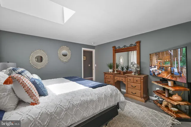 a bathroom with a tub and sink