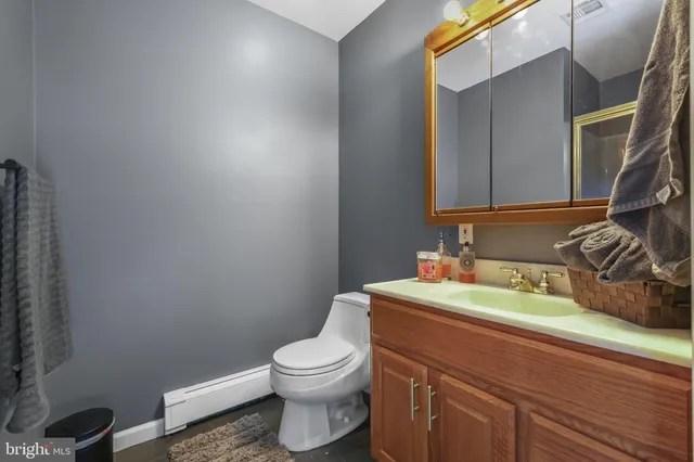 a bed room with a bed and a window