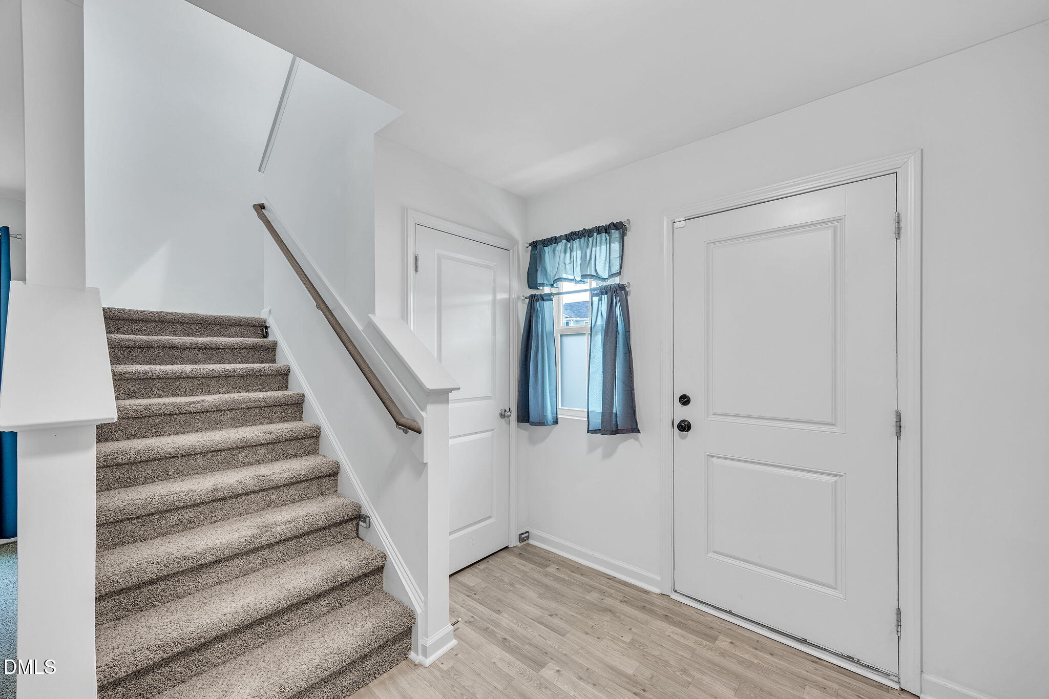 177 Yellowwood Avenue Spring Hope, NC 27882 - Photo 8 of 31 a view of staircase with white walls and white walls