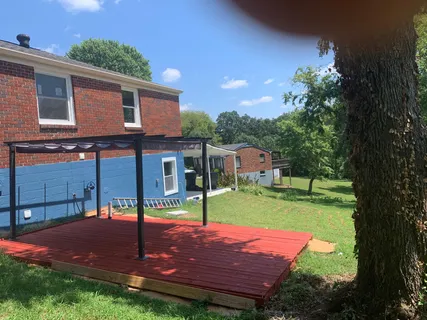 a view of a backyard with a garden