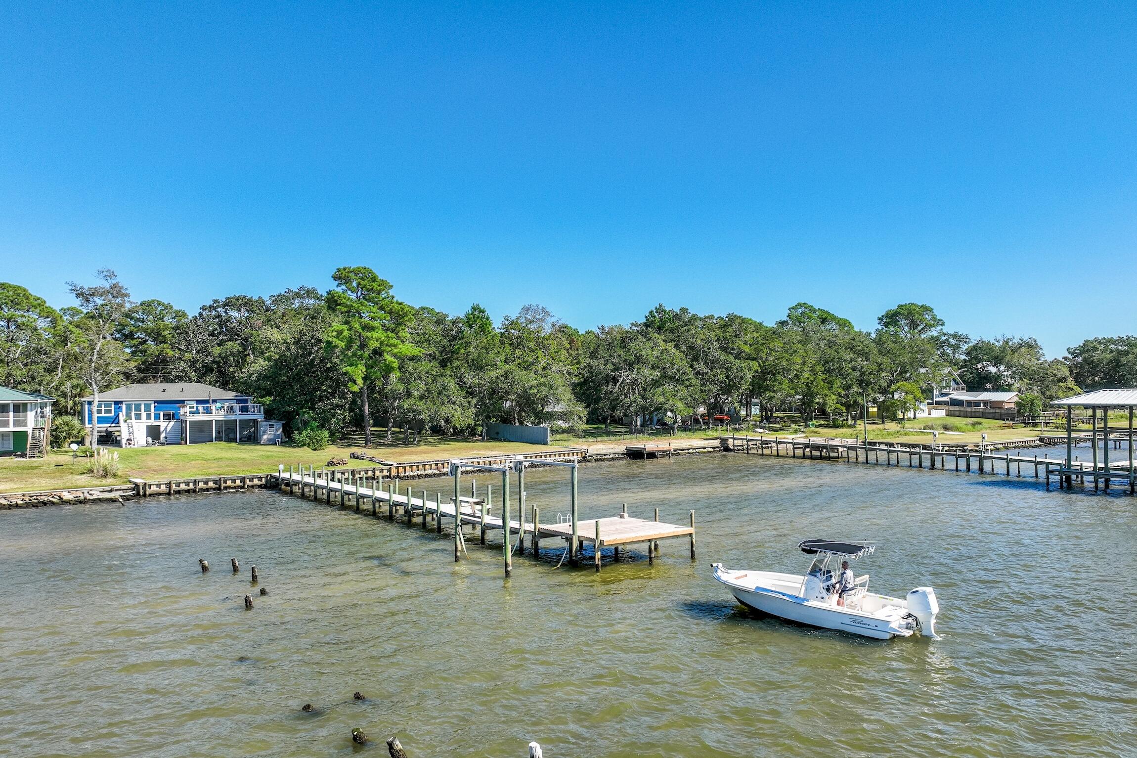2766 Bay Grove Road Freeport, FL 32439 - Photo 11 of 55 a view of a lake with houses