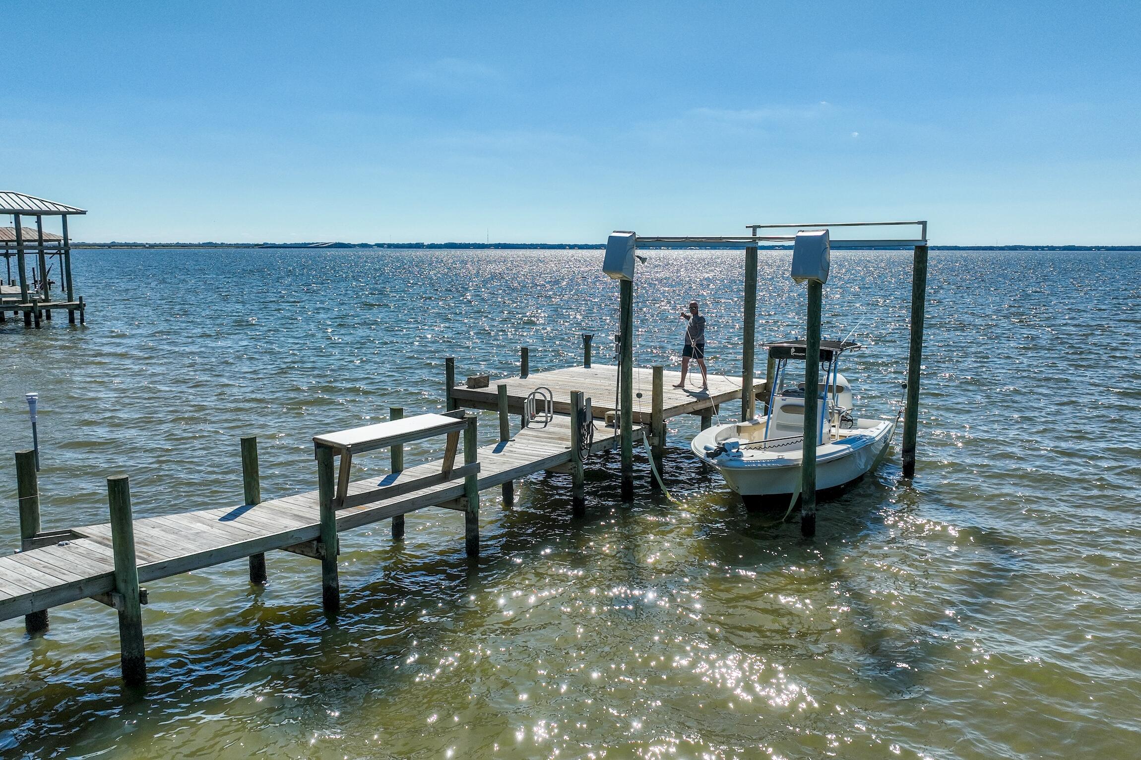 2766 Bay Grove Road Freeport, FL 32439 - Photo 17 of 55 a view of a terrace with chairs