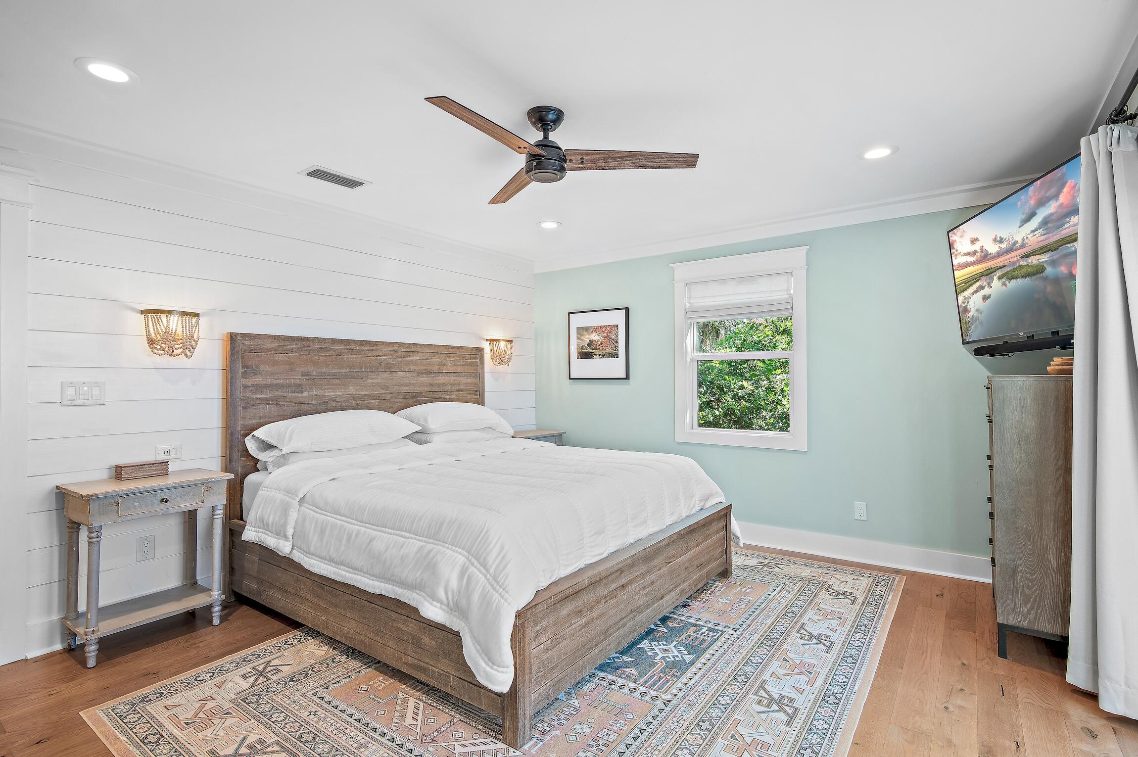 2766 Bay Grove Road Freeport, FL 32439 - Photo 30 of 55 a bedroom with a large bed and a window