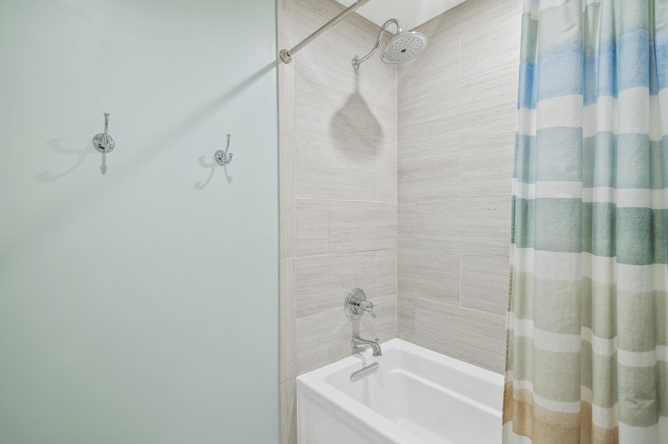 2766 Bay Grove Road Freeport, FL 32439 - Photo 38 of 55 a bathroom with a sink a shower and a mirror