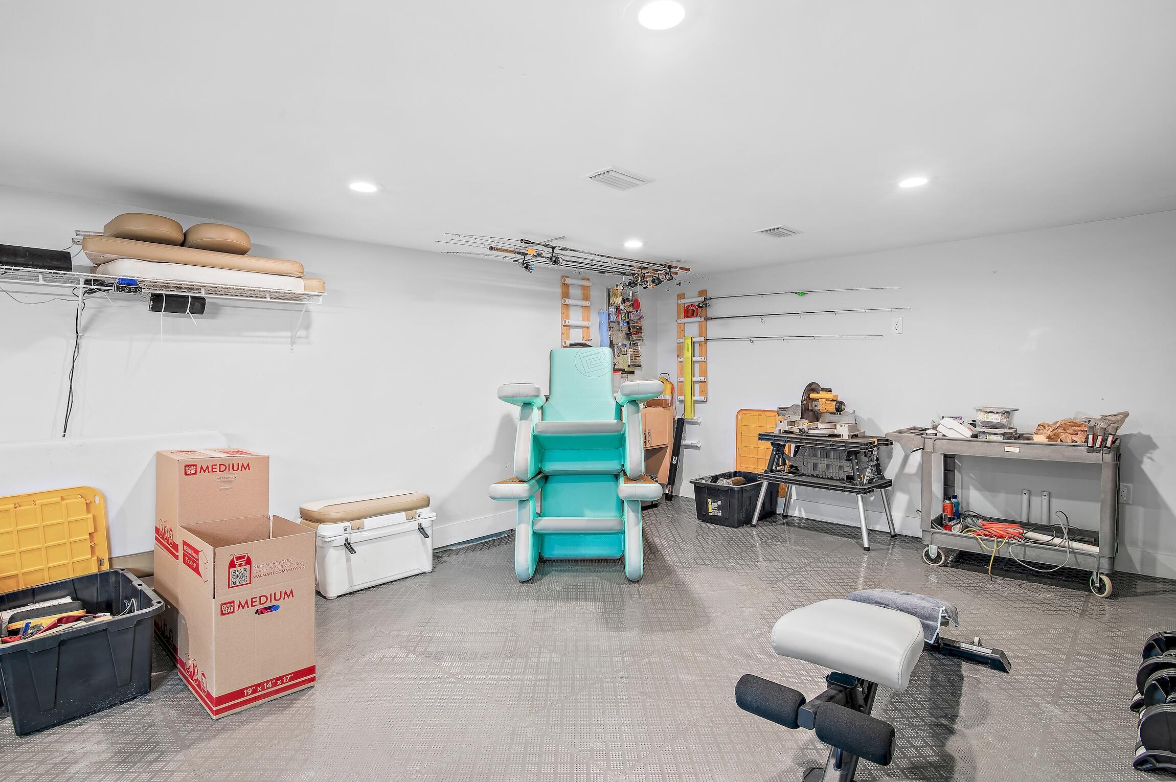 2766 Bay Grove Road Freeport, FL 32439 - Photo 40 of 55 a living room with furniture and a flat screen tv