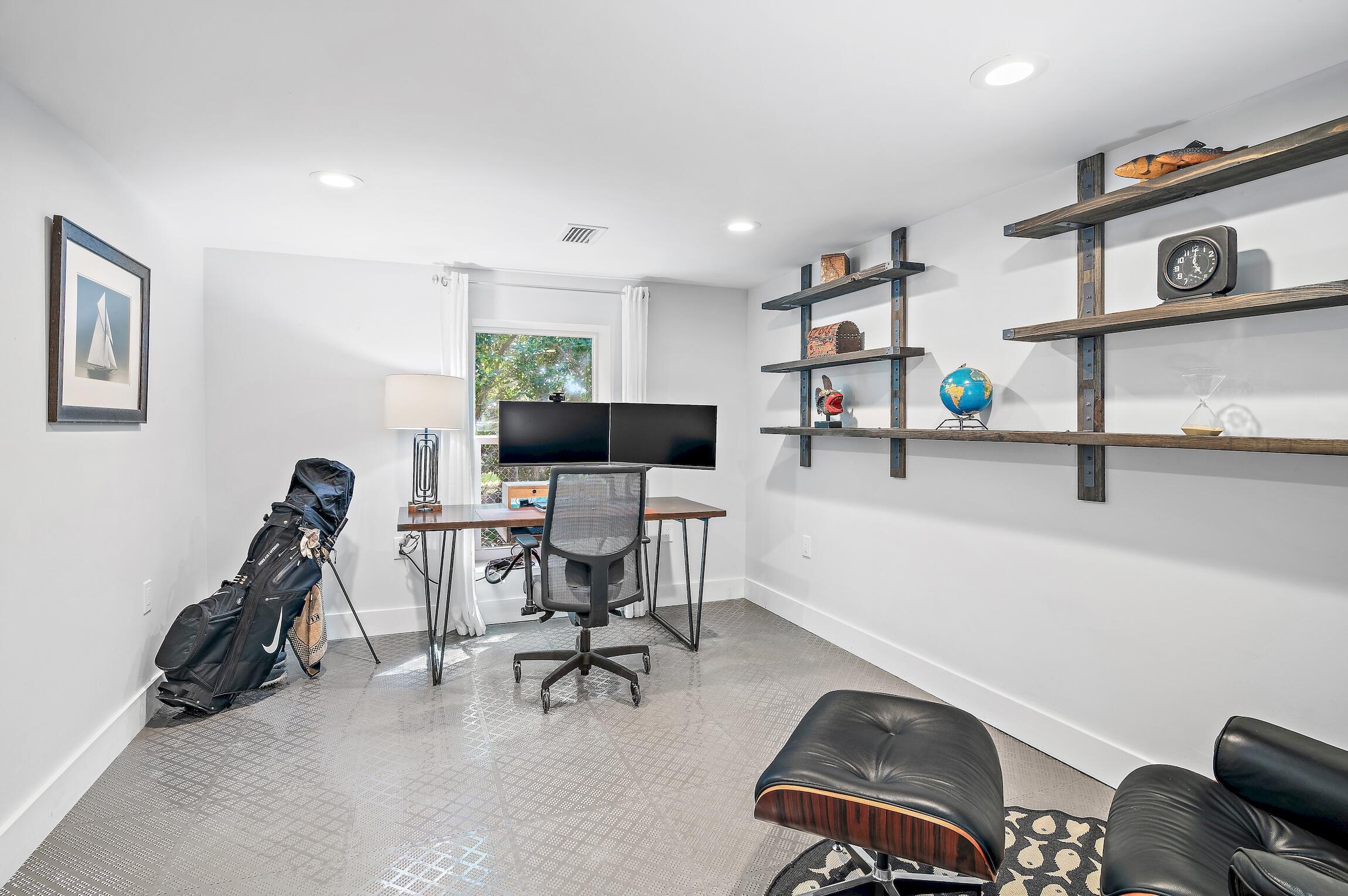 2766 Bay Grove Road Freeport, FL 32439 - Photo 41 of 55 a view of a workspace with furniture