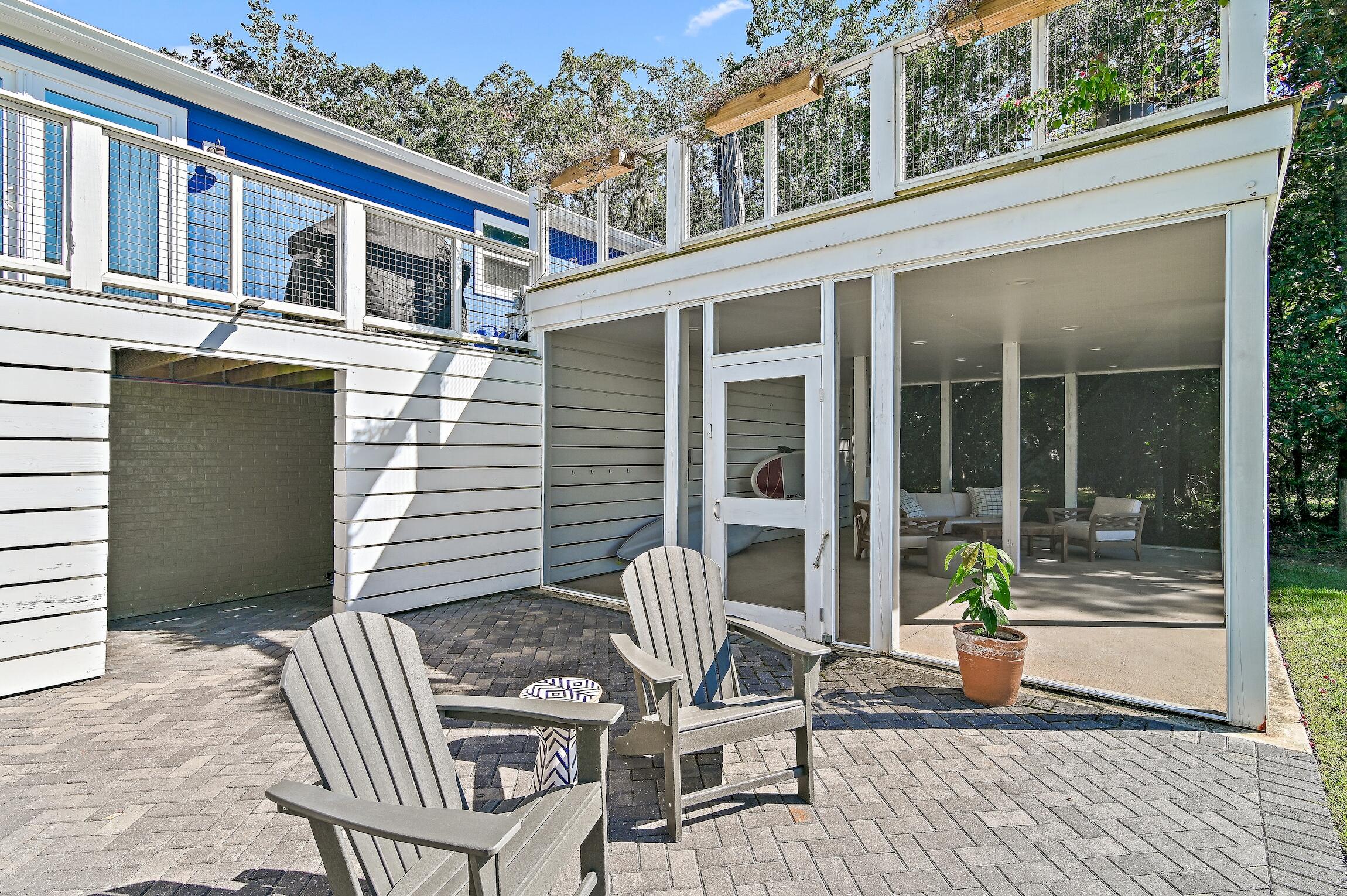 2766 Bay Grove Road Freeport, FL 32439 - Photo 43 of 55 a view of a chair and table in the balcony