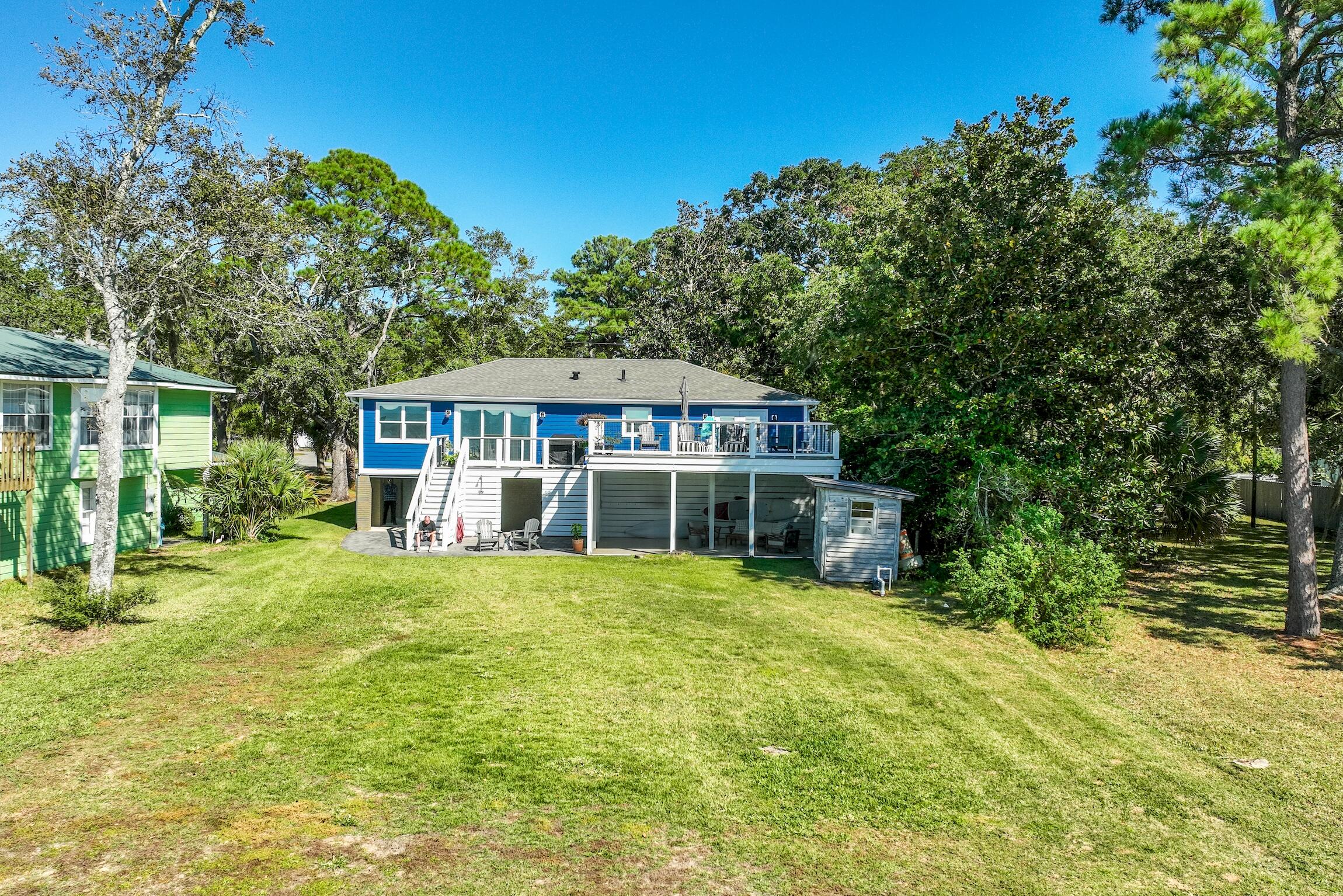 2766 Bay Grove Road Freeport, FL 32439 - Photo 5 of 55 a house view with a garden space