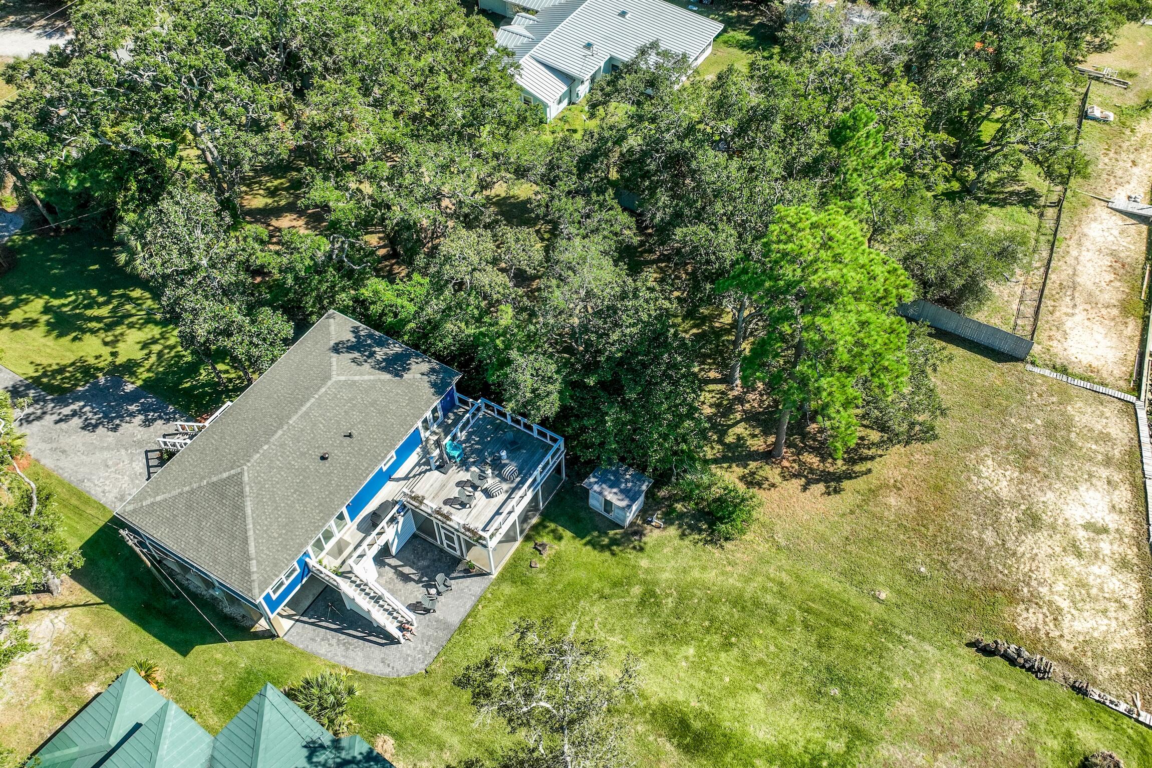 2766 Bay Grove Road Freeport, FL 32439 - Photo 7 of 55 an aerial view of residential house with outdoor space and trees all around