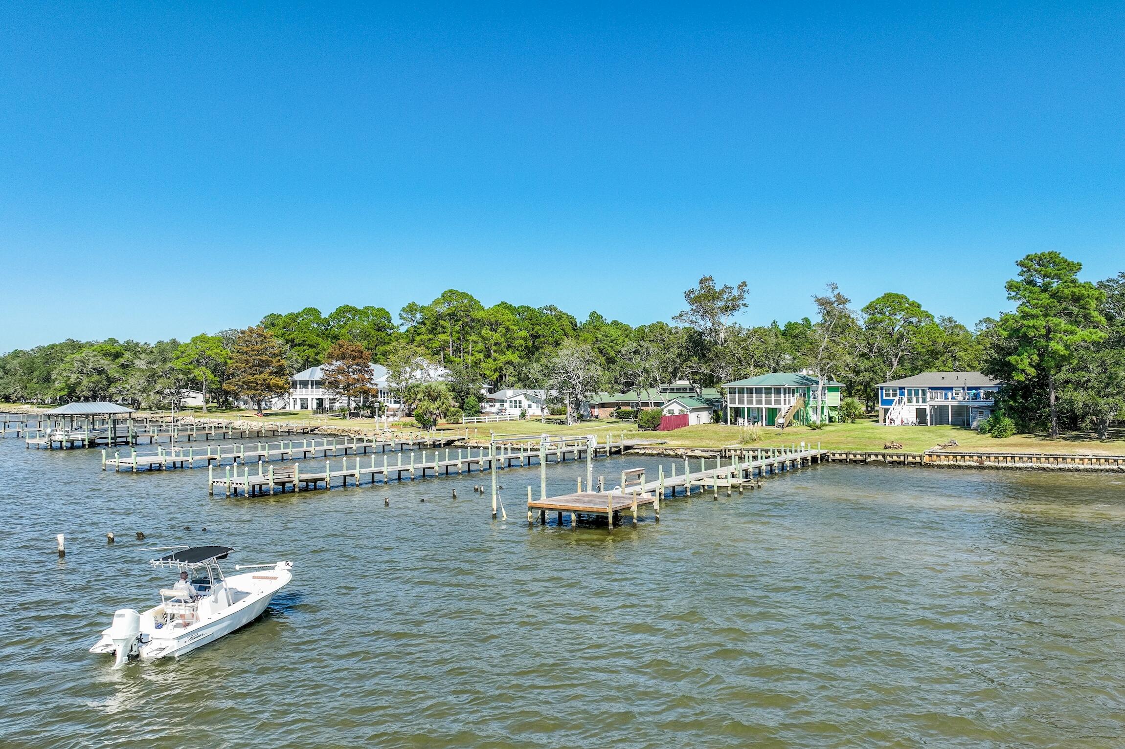 2766 Bay Grove Road Freeport, FL 32439 - Photo 10 of 55 a view of a lake with houses