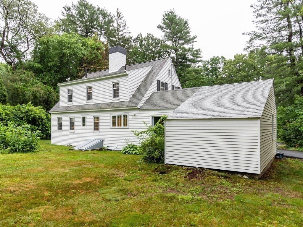 106 Boston Post Road Wayland, MA 01778 - Photo 3 of 42 a house that has a tree in front of it