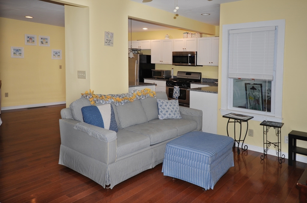 9 15th Street Wareham, MA 02558 - Photo 11 of 27 a living room with furniture and a wooden floor