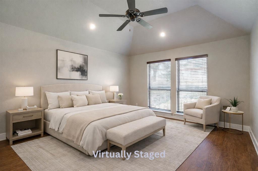 110 Hummingbird Drive Weatherford, TX 76085 - Photo 18 of 38 a spacious bedroom with a bed a couch and a window