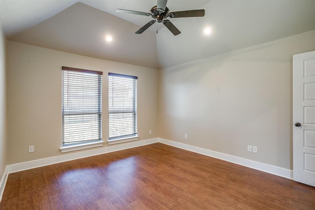 110 Hummingbird Drive Weatherford, TX 76085 - Photo 20 of 38 wooden floor in an empty room with a window