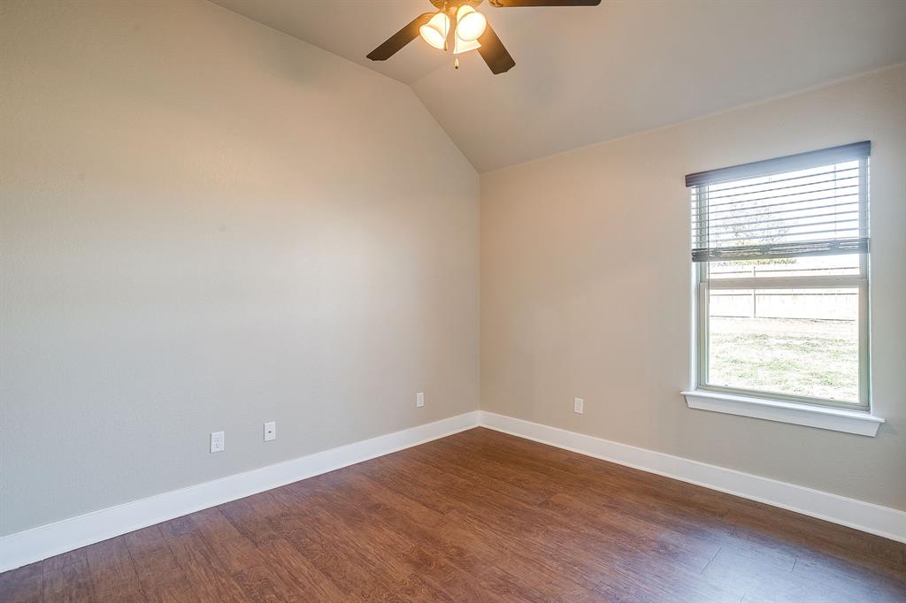 110 Hummingbird Drive Weatherford, TX 76085 - Photo 29 of 38 wooden floor in an empty room with a window