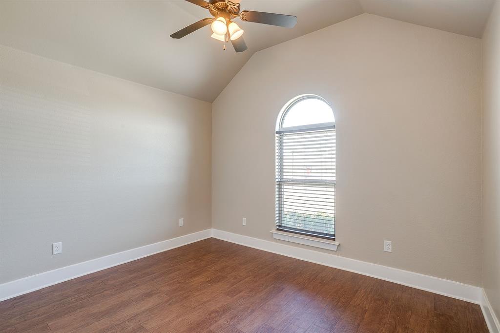 110 Hummingbird Drive Weatherford, TX 76085 - Photo 33 of 38 wooden floor in an empty room with a window