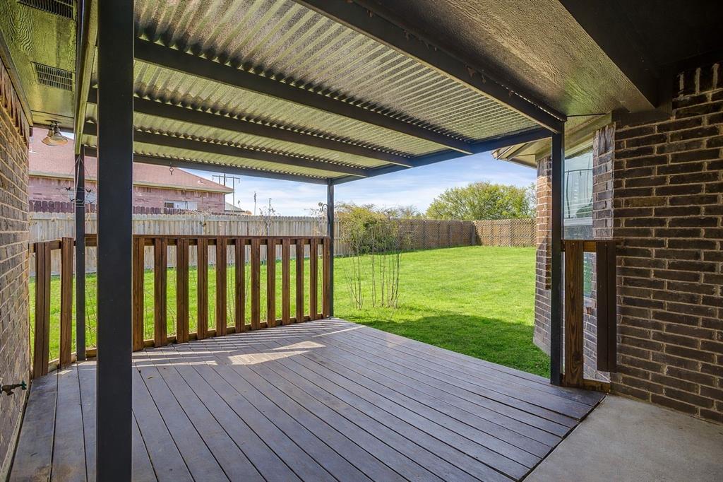 110 Hummingbird Drive Weatherford, TX 76085 - Photo 37 of 38 a view of a deck with a big yard